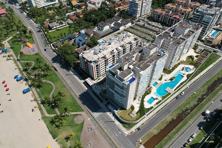 Home 43| Apto em cond Pé na Areia em Bertioga