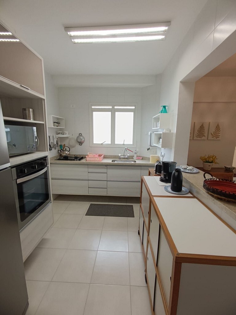 Home 10| Ap com varanda gourmet em Bertioga