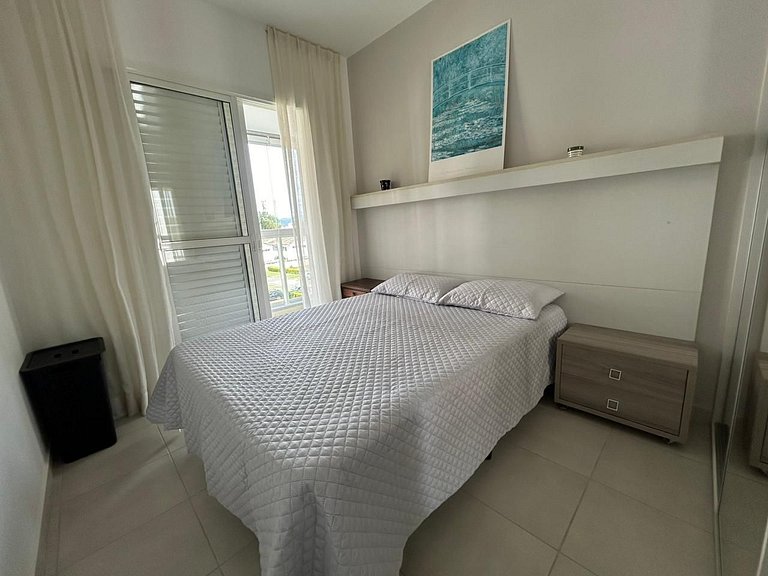 Home 10| Ap com varanda gourmet em Bertioga