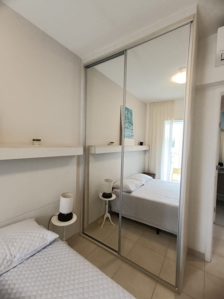 Home 10| Ap com varanda gourmet em Bertioga