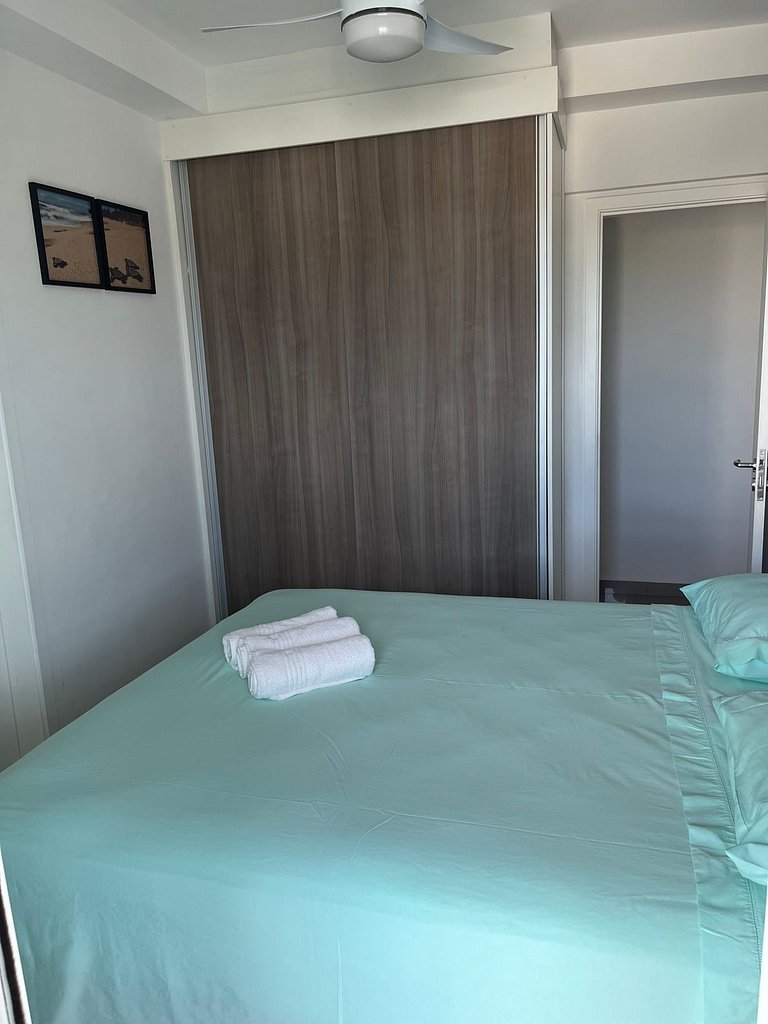 Home 12| Ap piscina aquecida pé na areia Bertioga