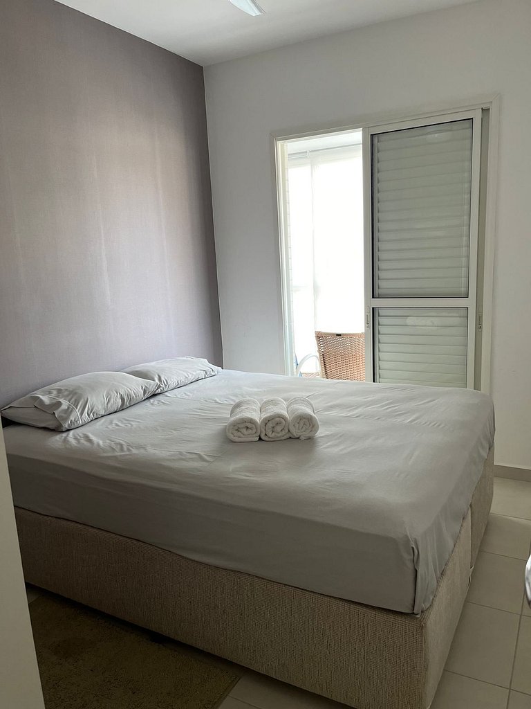 Home 12| Ap piscina aquecida pé na areia Bertioga