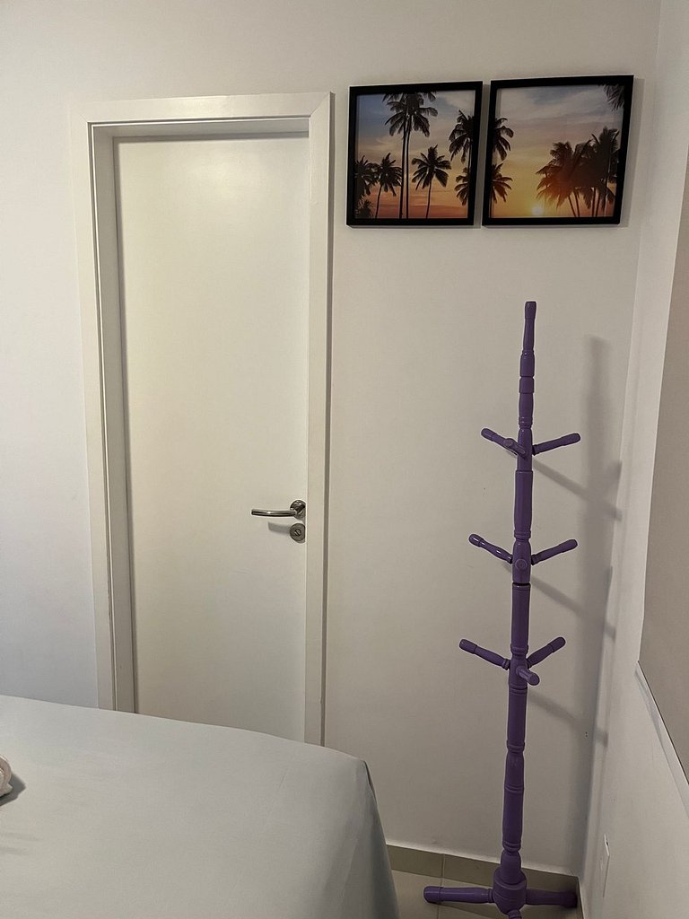 Home 12| Ap piscina aquecida pé na areia Bertioga