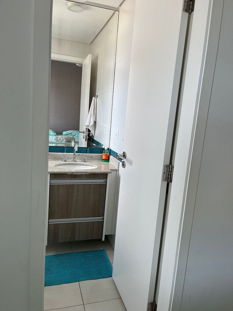 Home 12| Ap piscina aquecida pé na areia Bertioga