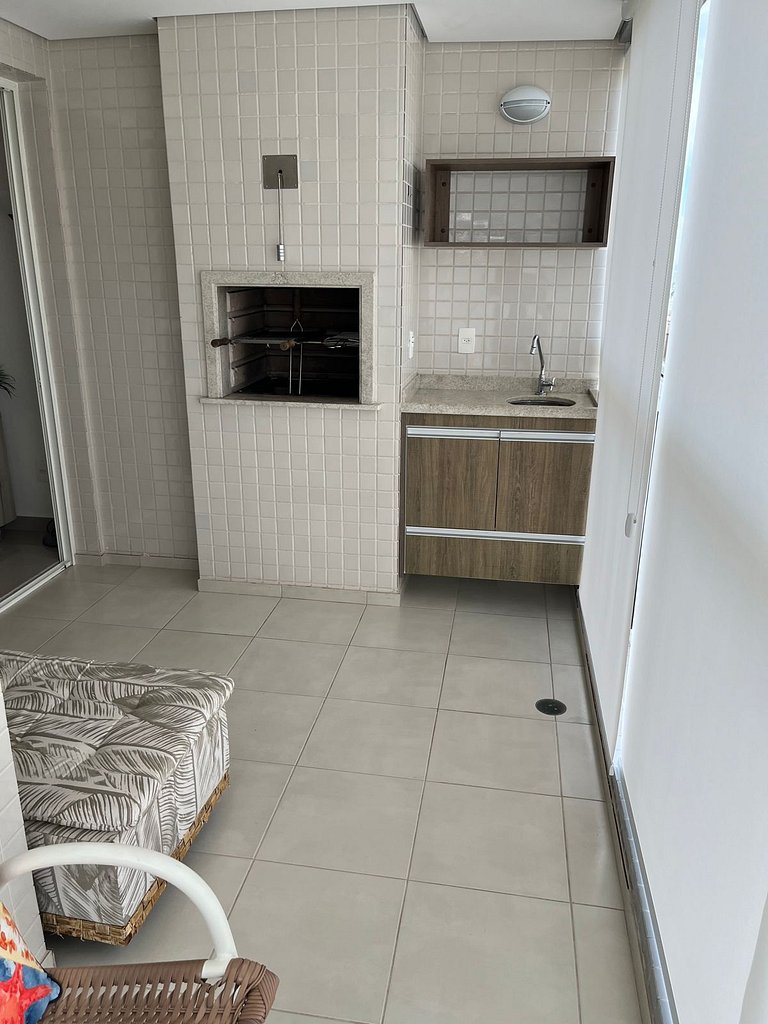 Home 12| Ap piscina aquecida pé na areia Bertioga