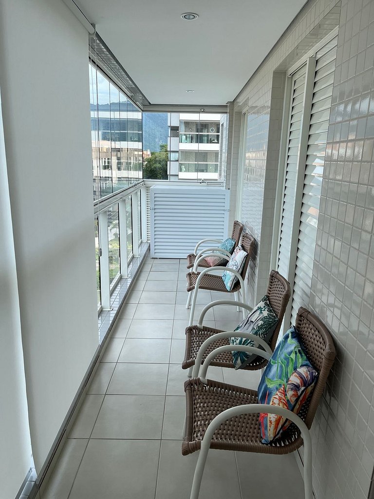 Home 12| Ap piscina aquecida pé na areia Bertioga