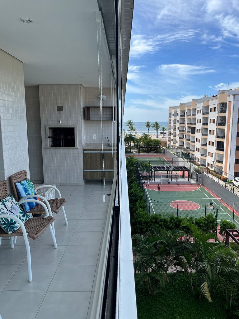 Home 12| Ap piscina aquecida pé na areia Bertioga