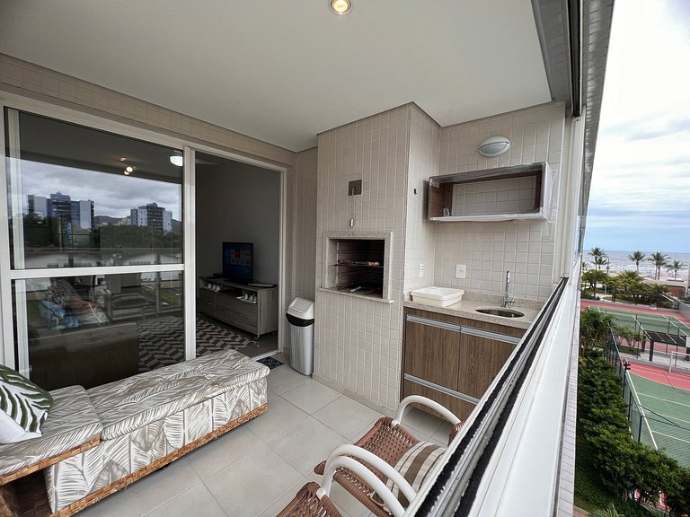 Home 12| Ap piscina aquecida pé na areia Bertioga
