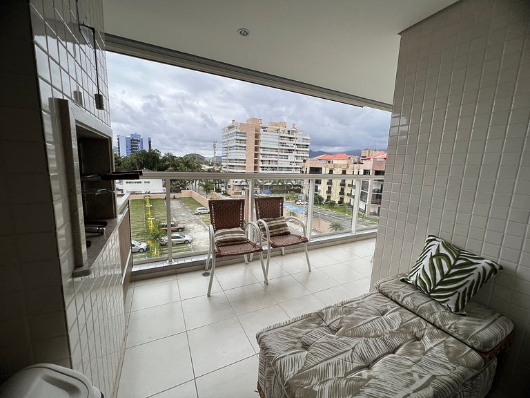 Home 12| Ap piscina aquecida pé na areia Bertioga