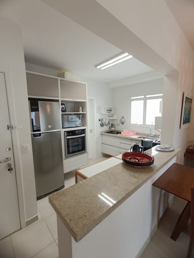 Home 10| Ap com varanda gourmet em Bertioga