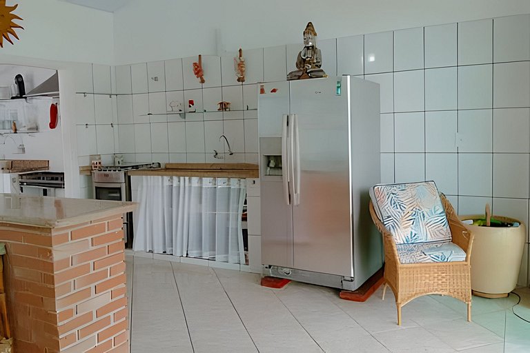 Casa em condomínio com piscina em Bertioga HM178