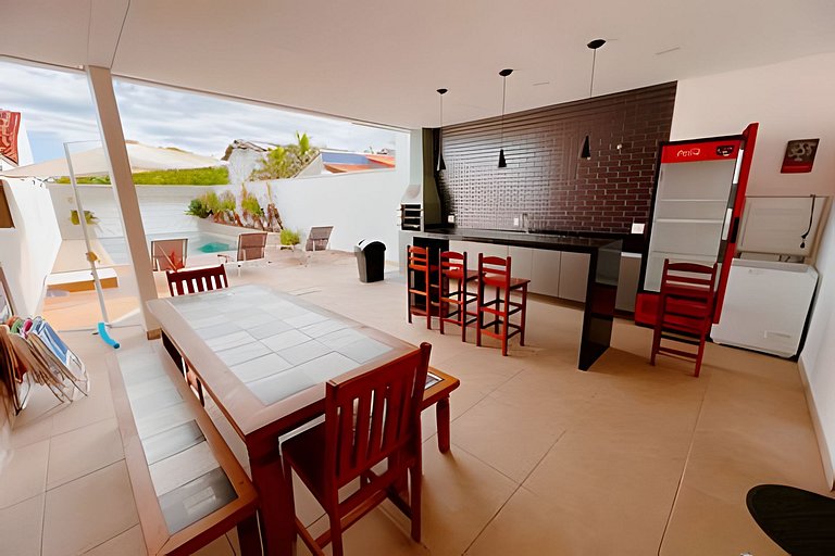 Casa em cond. c/ 4 suítes e piscina aquecida HM177